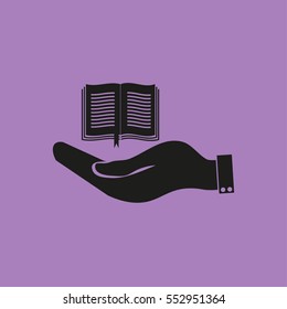 hand holding a open book