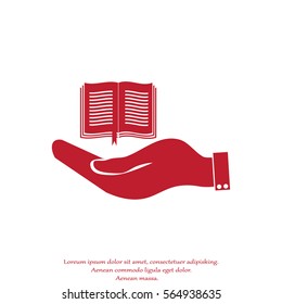 hand holding a open book