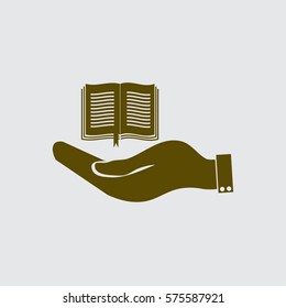 hand holding a open book