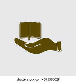 hand holding a open book