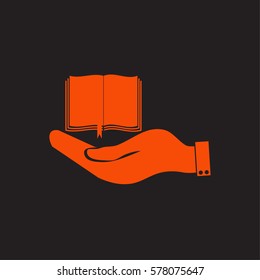 hand holding a open book