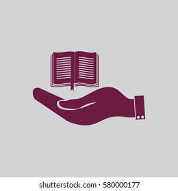 hand holding a open book
