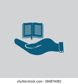 hand holding a open book