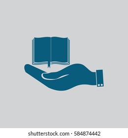 hand holding a open book