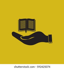 hand holding a open book