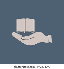 hand holding a open book