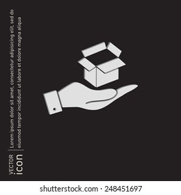 hand holding a Opened cardboard box