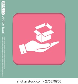 hand holding a Opened cardboard box