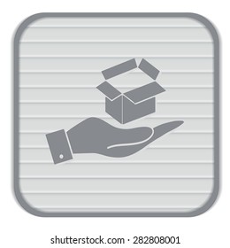 hand holding a Opened cardboard box