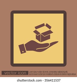 hand holding a Opened cardboard box