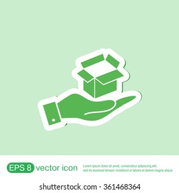 hand holding a Opened cardboard box