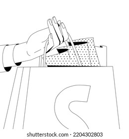 The hand is holding a package.