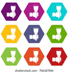 Hand holding paint brush icon set many color hexahedron isolated on white vector illustration