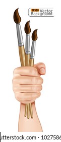 Hand holding paint brushes.vector