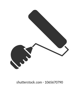 Hand holding paint roller glyph icon. Silhouette symbol. Painting, dyeing. Negative space. Vector isolated illustration
