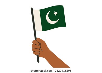 Hand holding Pakistani flag with crescent and star on white background