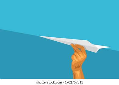 hand holding a paper plane