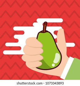 hand holding pear fresh colored background