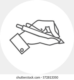 Hand holding pen