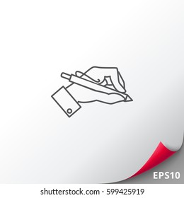 Hand holding pen