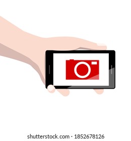 Teléfono de mano con icono de cámara roja en pantalla