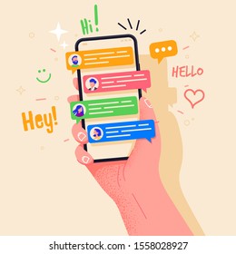 Hand holding phone with short messages, icons and emoticons. Chatting with friends and sending new messages. Colorful speech bubbles boxes on smartphone screen flat design vector illustration.