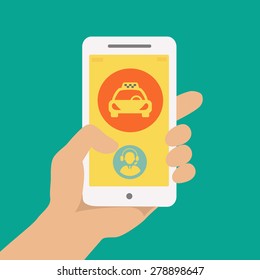 Hand holding phone with taxi hire service application running