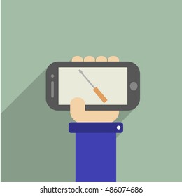 Hand holding a phone whith screwdriver