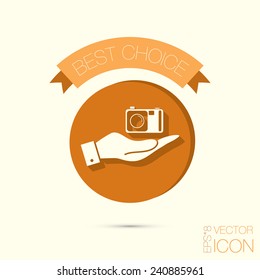 hand holding a photo camera