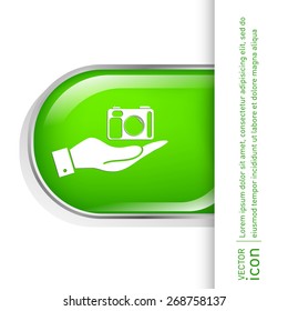 hand holding a photo camera