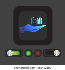 hand holding a photo camera