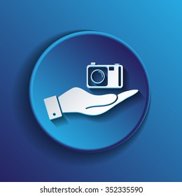 hand holding a photo camera