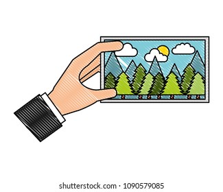 hand holding piece of art picture