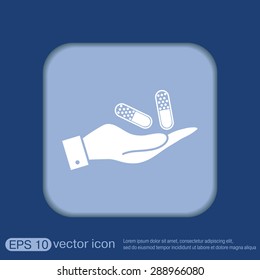 hand holding a pill tablet sign. symbol of medicine and health. icon pills and tablets .