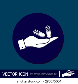 hand holding a pill tablet sign. symbol of medicine and health. icon pills and tablets .