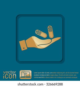 hand holding a pill tablet sign. symbol of medicine and health. icon pills and tablets .
