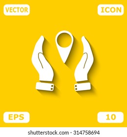 Hand holding a pin location