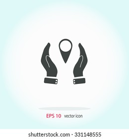 Hand holding a pin location vector icon.