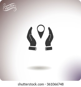 Hand holding a pin location vector icon.