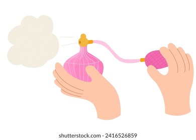 Hand holding a pink parfume. Cologne and fragnance, scent.International Fragrance Day.