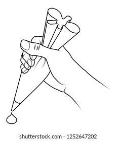 A hand holding a piping bag with a dollop of shaped icing mixture.