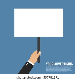 Hand holding placard with empty space