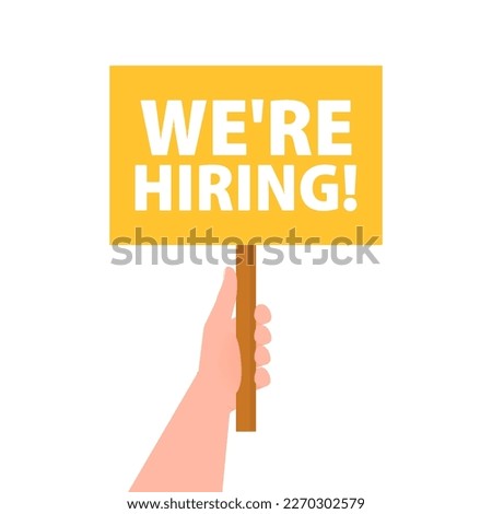 Hand holding placard with space for text we're hiring
