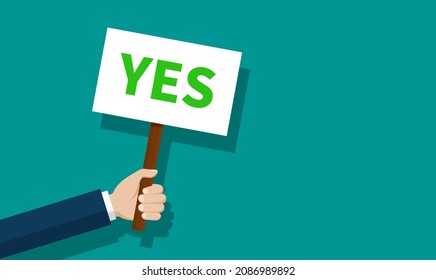 Hand holding placard with yes. Man holding board and say yes. Sign for protest, victory and picket. Banner in arm for protest concept. Poster from people about agree. Flat positive icon. Vector.