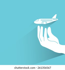 hand holding plane, travel concept on blue background, flat and shadow theme