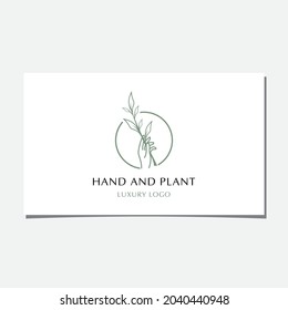 Hand Holding Plant Logo Design