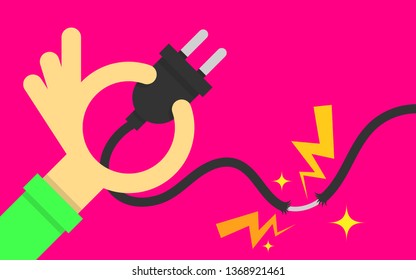 Hand holding a plug, which dangerous short circuit from torn power cable.