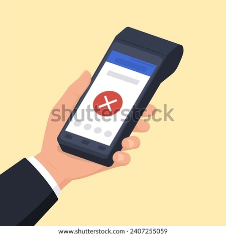 Hand holding a POS machine showing a declined payment