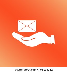 hand holding a postal envelope