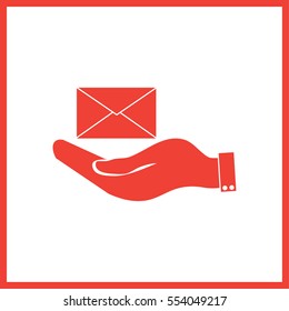 hand holding a postal envelope